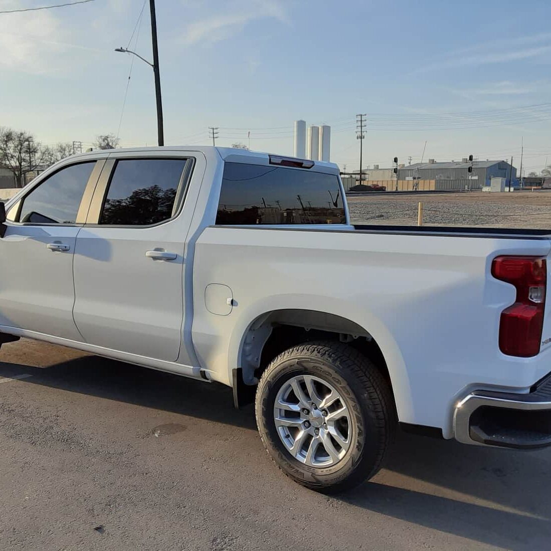 White truck tinted at TINT plus auto glass in Hanford